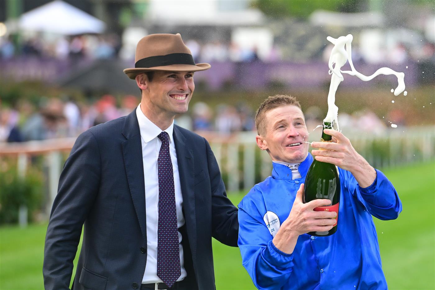 MELBOURNE, AUSTRALIA - OCTOBER 22: James McDonald and Trainer James Cummings celebrate after Anamoe won Race 9, the Ladbrokes Cox Plate,  during Cox Plate Day at Moonee Valley Racecourse on October 22, 2022 in Melbourne, Australia. (Photo by Vince Caligiuri/Getty Images)