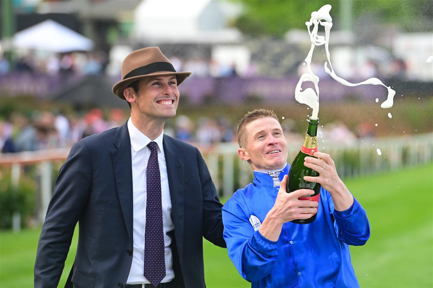 MELBOURNE, AUSTRALIA - OCTOBER 22: James McDonald and Trainer James Cummings celebrate after Anamoe won Race 9, the Ladbrokes Cox Plate,  during Cox Plate Day at Moonee Valley Racecourse on October 22, 2022 in Melbourne, Australia. (Photo by Vince Caligiuri/Getty Images)