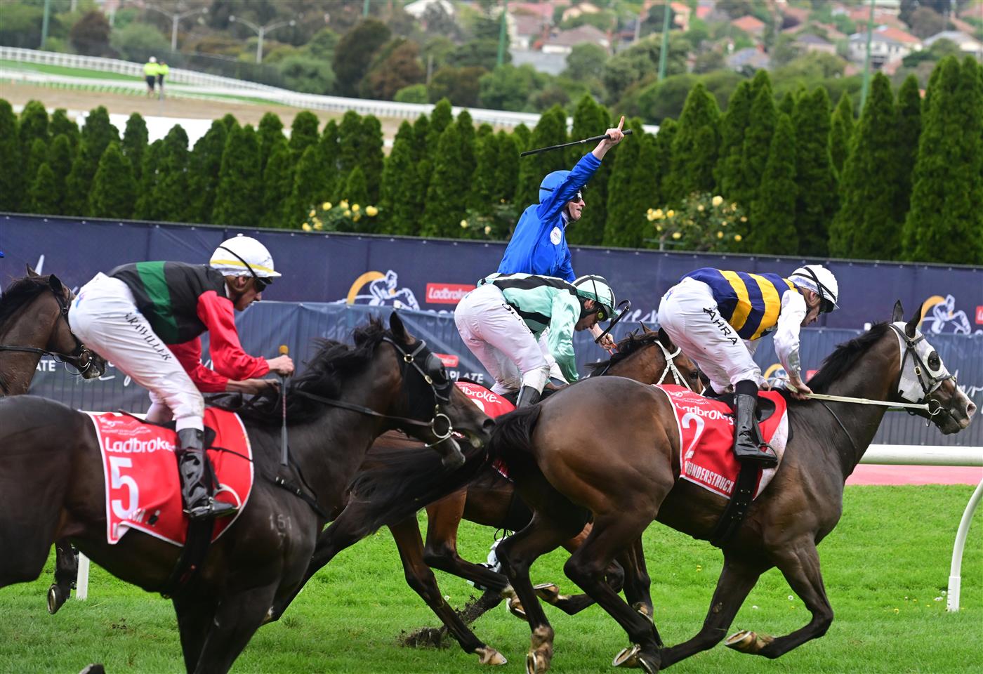 MELBOURNE, AUSTRALIA - OCTOBER 22: James McDonald riding Anamoe defeating Mark Zahra riding I