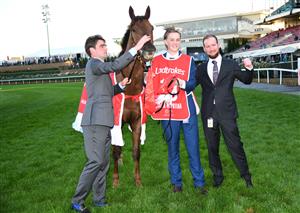 MELBOURNE, AUSTRALIA - OCTOBER 22: Co trainers David Eustace and Ciaron Maher pose with Bella Nipotina after winning race 11, the Ladbrokes Manikato Stakes during Cox Plate Day at Moonee Valley Racecourse on October 22, 2022 in Melbourne, Australia. (Photo by Vince Caligiuri/Getty Images)