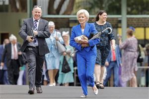 SYDNEY, AUSTRALIA - OCTOBER 22: Racegoers run to get the best spots as the gates open ahead of Spring Champions Stakes Day at Royal Randwick Racecourse on October 22, 2022 in Sydney, Australia. (Photo by Jenny Evans/Getty Images)