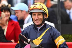 MELBOURNE, AUSTRALIA - OCTOBER 22: Damien Oliver after riding Arkansaw Kid to win Race 1, the Inglis Banner, during Cox Plate Day at Moonee Valley Racecourse on October 22, 2022 in Melbourne, Australia. (Photo by Vince Caligiuri/Getty Images)