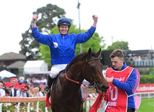 MELBOURNE, AUSTRALIA - OCTOBER 22: James McDonald riding Anamoe reacts after defeating Mark Zahra riding I