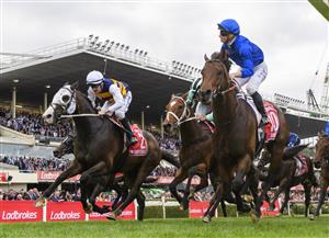 MELBOURNE, AUSTRALIA - OCTOBER 22: James McDonald riding Anamoe defeating Mark Zahra riding I