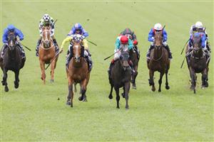SYDNEY, AUSTRALIA - OCTOBER 22: Regan Bayliss (red cap) on Diamil wins race 5 the Vale Beryl White Filante Handicap during Spring Champions Stakes Day at Royal Randwick Racecourse on October 22, 2022 in Sydney, Australia. (Photo by Jenny Evans/Getty Images)