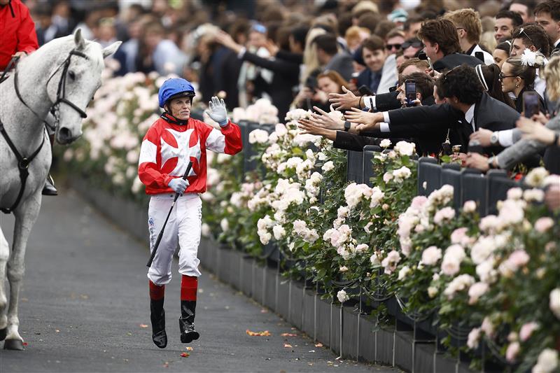 MELBOURNE, AUSTRALIA - OCTOBER 29:  Craig WIlliams returns to scale after riding #1 Icebath to win race eight the TAB Empire Rose Stakes during 2022 Penfolds Victoria Derby Day at Flemington Racecourse on October 29, 2022 in Melbourne, Australia. (Photo by Daniel Pockett/Getty Images)