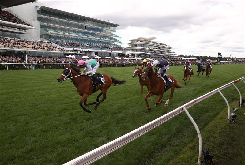 MELBOURNE, AUSTRALIA - OCTOBER 29: James McDonald riding #8 Surefire wins race two the Lexus Archer Stakes during 2022 Penfolds Victoria Derby Day at Flemington Racecourse on October 29, 2022 in Melbourne, Australia. (Photo by Robert Cianflone/Getty Images)