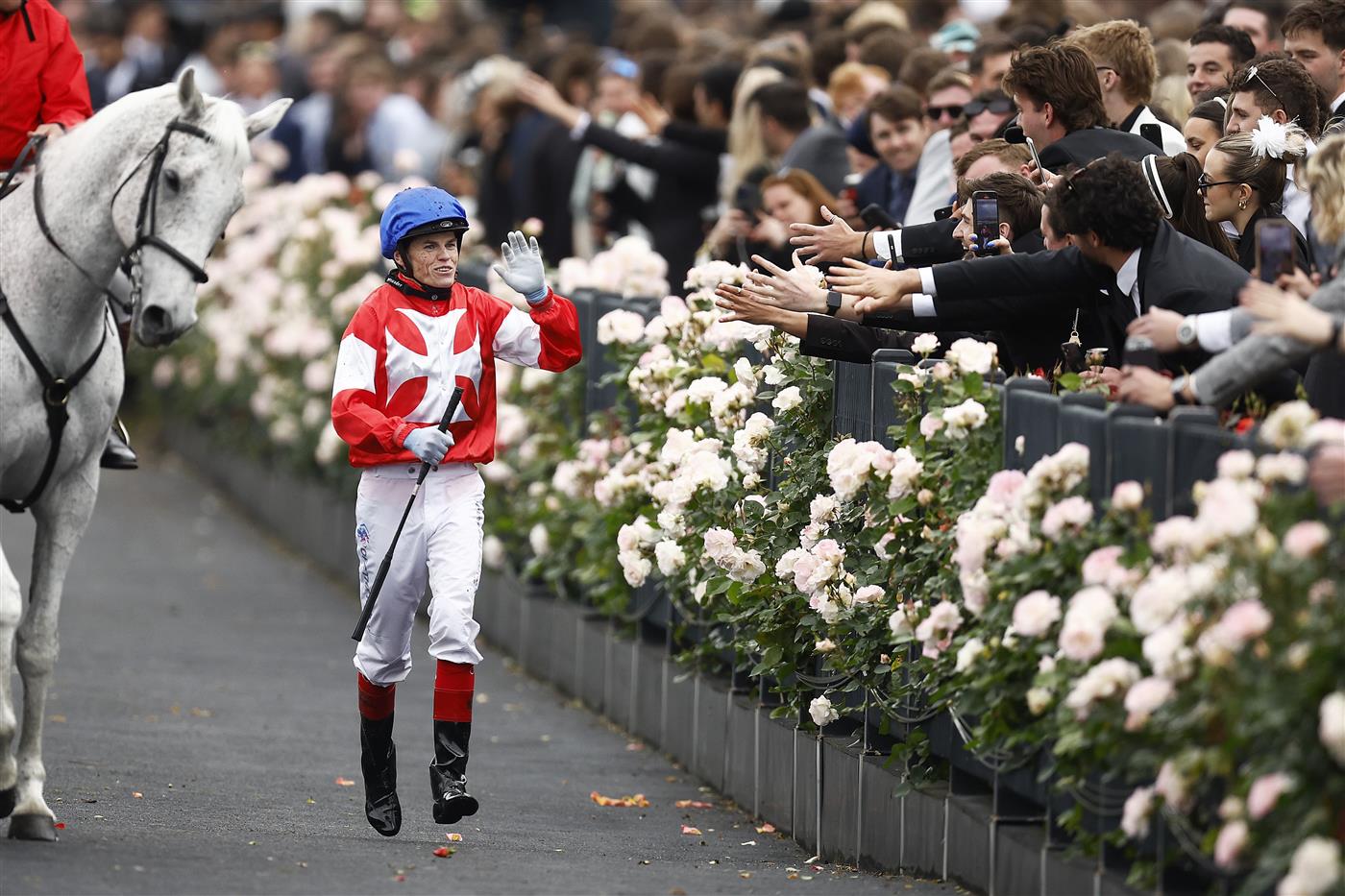 MELBOURNE, AUSTRALIA - OCTOBER 29:  Craig WIlliams returns to scale after riding #1 Icebath to win race eight the TAB Empire Rose Stakes during 2022 Penfolds Victoria Derby Day at Flemington Racecourse on October 29, 2022 in Melbourne, Australia. (Photo by Daniel Pockett/Getty Images)