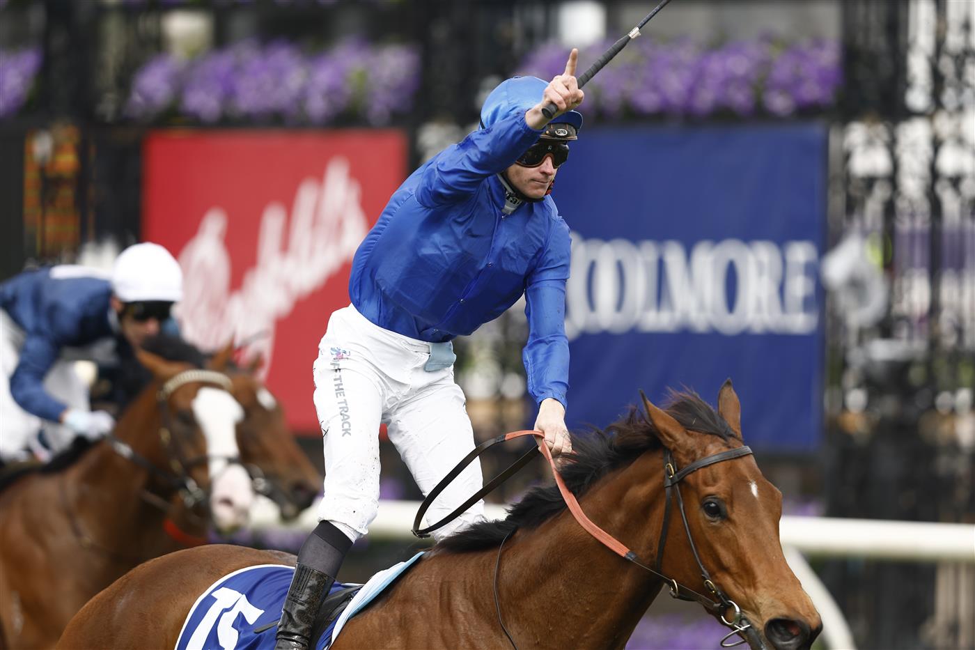 MELBOURNE, AUSTRALIA - OCTOBER 29: James McDonald rides In Secret to win 1race 6 the Coolmore Stud Stakes during 2022 Penfolds Victoria Derby Day at Flemington Racecourse on October 29, 2022 in Melbourne, Australia. (Photo by Darrian Traynor/Getty Images)