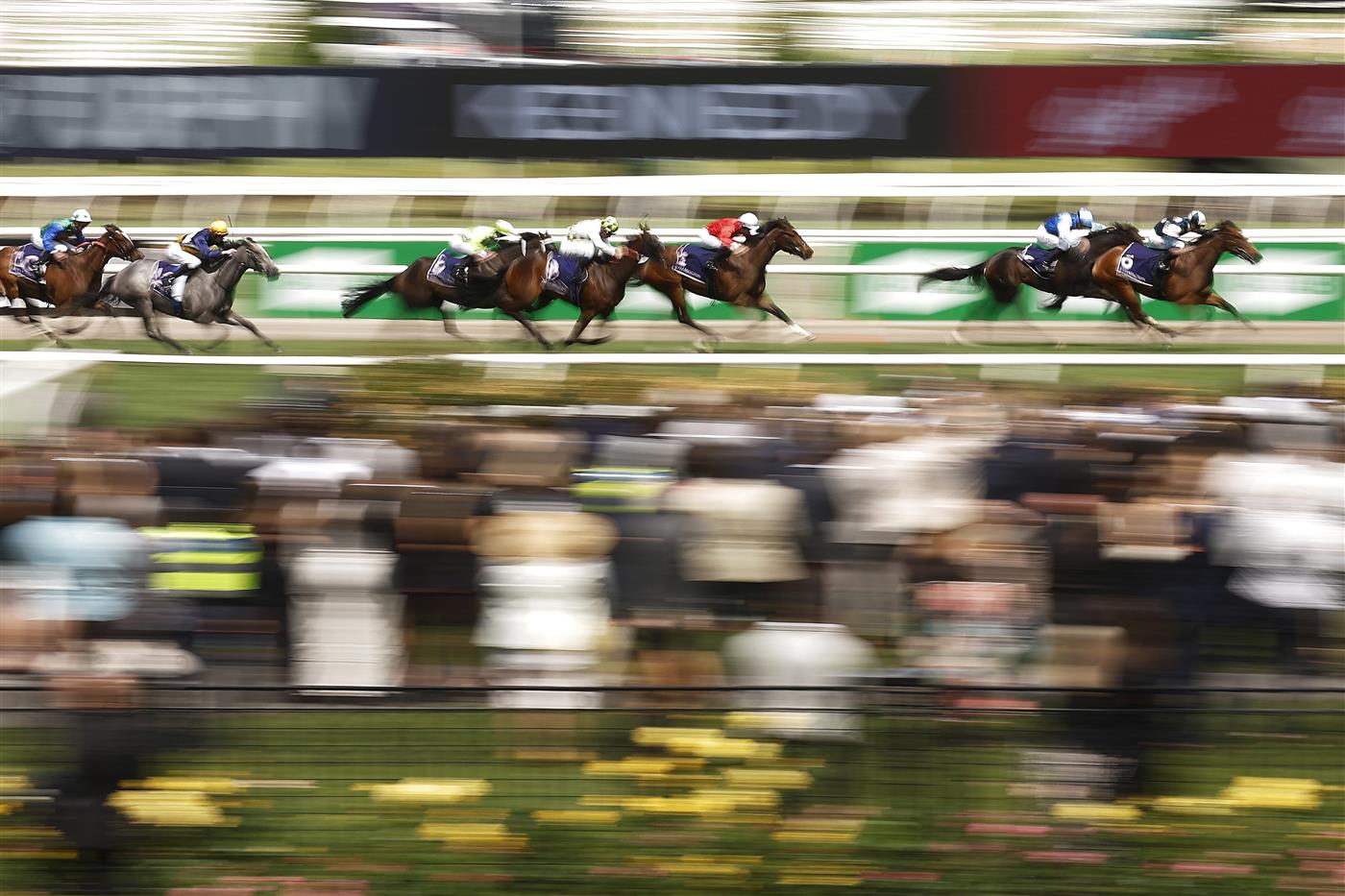 MELBOURNE, AUSTRALIA - OCTOBER 29: James McDonald rides Zennzella (R) to win race 4 the Racing and Sports Wakeful Stakes during 2022 Penfolds Victoria Derby Day at Flemington Racecourse on October 29, 2022 in Melbourne, Australia. (Photo by Daniel Pockett/Getty Images)