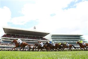 MELBOURNE, AUSTRALIA - OCTOBER 29: Damien Oliver riding #9 Argentia wins race three the Paramount+ Rising Fast Stakes during 2022 Penfolds Victoria Derby Day at Flemington Racecourse on October 29, 2022 in Melbourne, Australia. (Photo by Robert Cianflone/Getty Images)