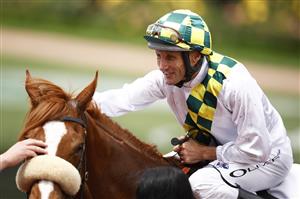 MELBOURNE, AUSTRALIA - OCTOBER 29: Damien Oliver returns to scale on Argentia after winning race 3 the Paramount + Rising Fast Stakes during 2022 Penfolds Victoria Derby Day at Flemington Racecourse on October 29, 2022 in Melbourne, Australia. (Photo by Daniel Pockett/Getty Images)