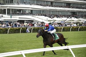 MELBOURNE, AUSTRALIA - OCTOBER 29: James McDonald rides Old Flame to win race 5 the TAB Linlithgow Stakes during 2022 Penfolds Victoria Derby Day at Flemington Racecourse on October 29, 2022 in Melbourne, Australia. (Photo by Darrian Traynor/Getty Images)