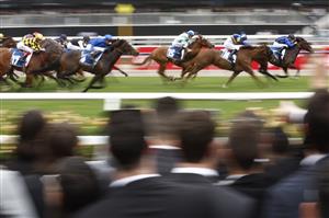 MELBOURNE, AUSTRALIA - OCTOBER 29: John Allen rides to Asfoora to win race 9 the Furphy Sprint during 2022 Penfolds Victoria Derby Day at Flemington Racecourse on October 29, 2022 in Melbourne, Australia. (Photo by Darrian Traynor/Getty Images)