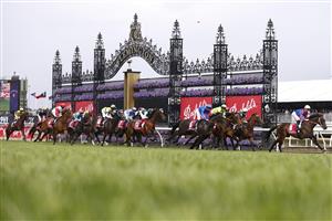 MELBOURNE, AUSTRALIA - OCTOBER 29: The field pass the finish line on the first straight of race seven the Penfolds Victoria Derby during 2022 Penfolds Victoria Derby Day at Flemington Racecourse on October 29, 2022 in Melbourne, Australia. (Photo by Daniel Pockett/Getty Images)