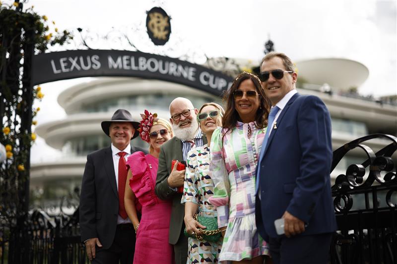 MELBOURNE, AUSTRALIA - NOVEMBER 01: Racegoers pose for a photograph during 2022 Lexus Melbourne Cup Day at Flemington Racecourse on November 01, 2022 in Melbourne, Australia. (Photo by Daniel Pockett/Getty Images)