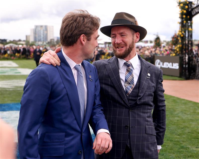 MELBOURNE, AUSTRALIA - NOVEMBER 01: Trainers David Eustace and Ciaron Maher embrace after Gold Trip won Race 7, during 2022 Melbourne Cup Day at Flemington Racecourse on November 01, 2022 in Melbourne, Australia. (Photo by Jonathan DiMaggio/Getty Images for VRC)
