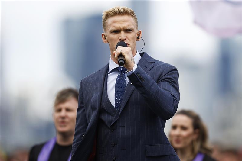MELBOURNE, AUSTRALIA - NOVEMBER 01: Australian singer and swimmer Cody Simpson sings the national anthem ahead of race seven, the Lexus Melbourne Cup during 2022 Lexus Melbourne Cup Day at Flemington Racecourse on November 01, 2022 in Melbourne, Australia. (Photo by Daniel Pockett/Getty Images)