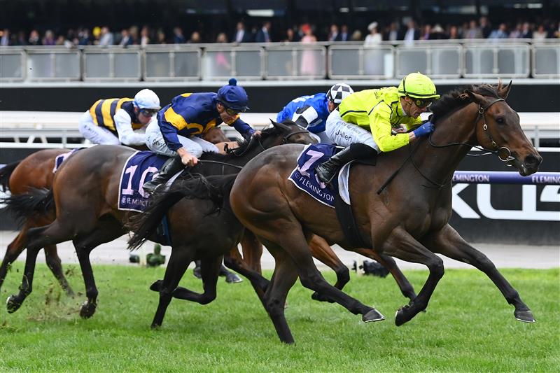 MELBOURNE, AUSTRALIA - NOVEMBER 01: John Allen riding Detonator Jack to win race eight the In Memory of Her Majesty Queen Elizabeth II during 2022 Lexus Melbourne Cup Day at Flemington Racecourse on November 01, 2022 in Melbourne, Australia. (Photo by Quinn Rooney/Getty Images)