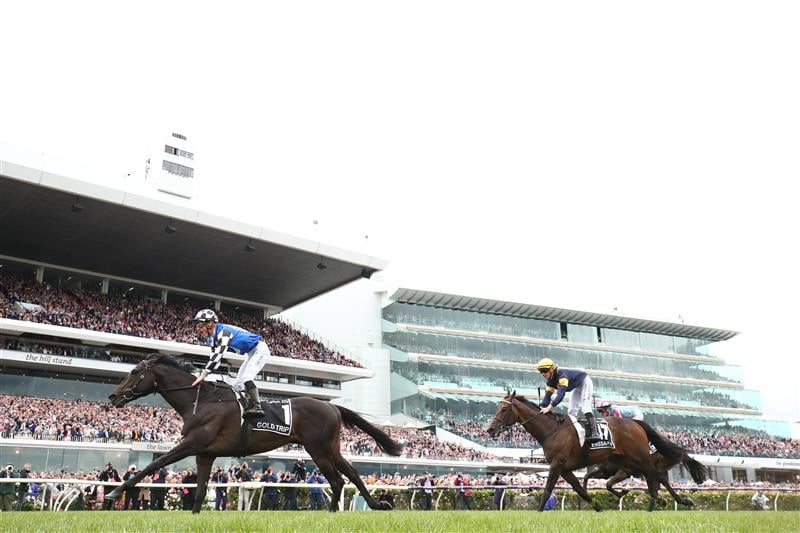 MELBOURNE, AUSTRALIA - NOVEMBER 01: Mark Zahra rides #1 Gold Trip to win race seven the Lexus Melbourne Cup during 2022 Lexus Melbourne Cup Day at Flemington Racecourse on November 01, 2022 in Melbourne, Australia. (Photo by Robert Cianflone/Getty Images)