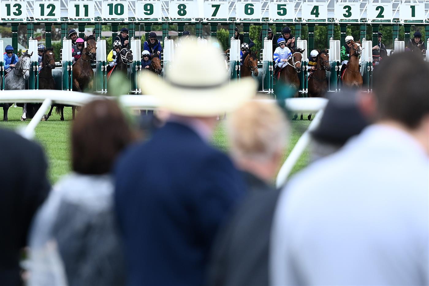 MELBOURNE, AUSTRALIA - NOVEMBER 01: The horses come out of the barriers in Race 2, The Macca's Run during 2022 Lexus Melbourne Cup Day at Flemington Racecourse on November 01, 2022 in Melbourne, Australia. (Photo by Robert Cianflone/Getty Images)