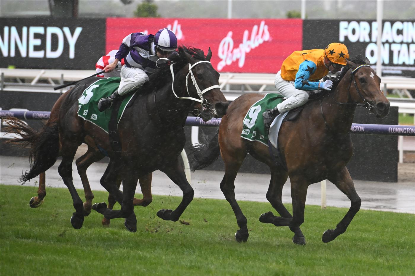 MELBOURNE, AUSTRALIA - NOVEMBER 01: Ben Melham riding High Approach winning Race 4, the Tab Trophy, during 2022 Lexus Melbourne Cup Day at Flemington Racecourse on November 01, 2022 in Melbourne, Australia. (Photo by Vince Caligiuri/Getty Images)