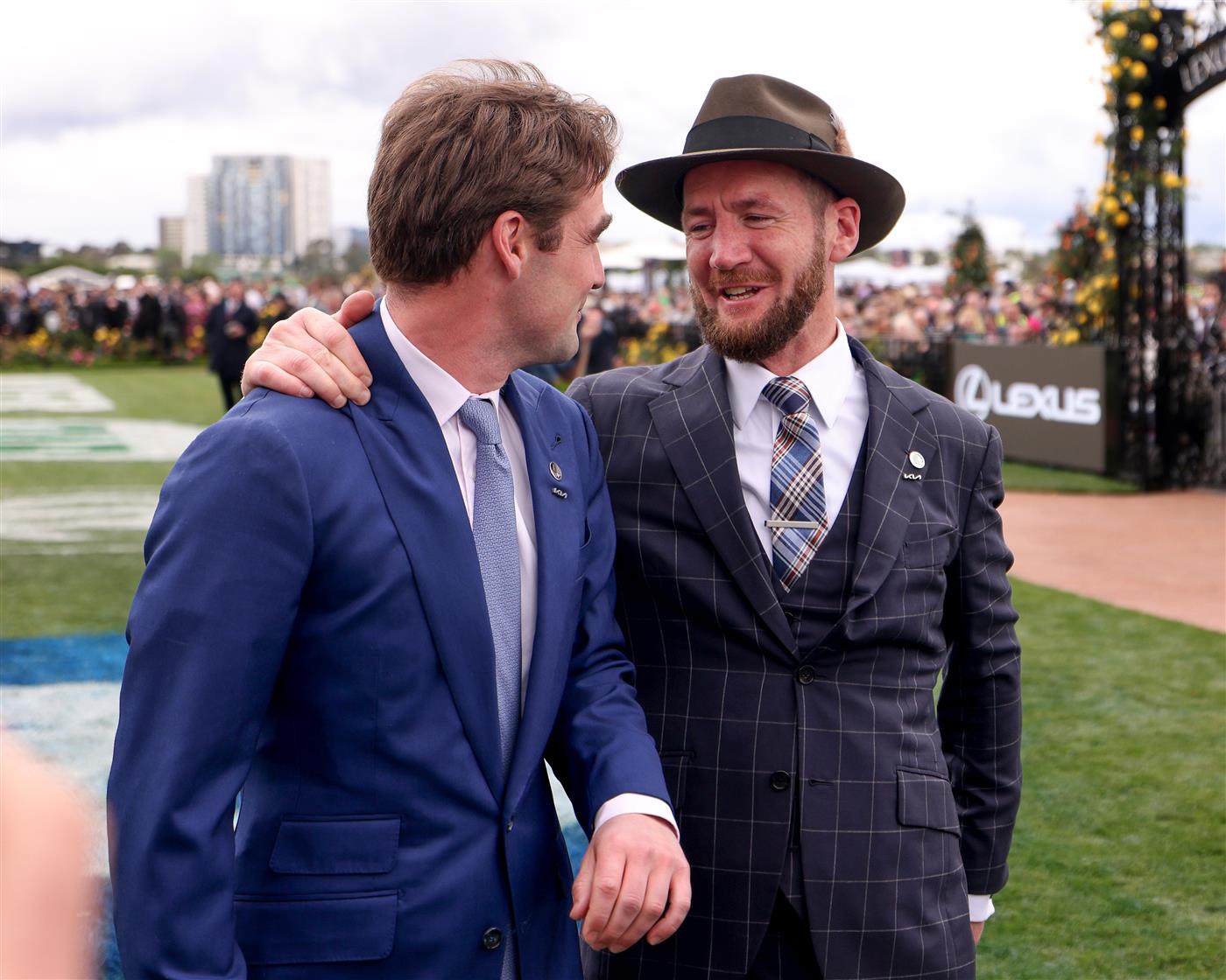 MELBOURNE, AUSTRALIA - NOVEMBER 01: Trainers David Eustace and Ciaron Maher embrace after Gold Trip won Race 7, during 2022 Melbourne Cup Day at Flemington Racecourse on November 01, 2022 in Melbourne, Australia. (Photo by Jonathan DiMaggio/Getty Images for VRC)