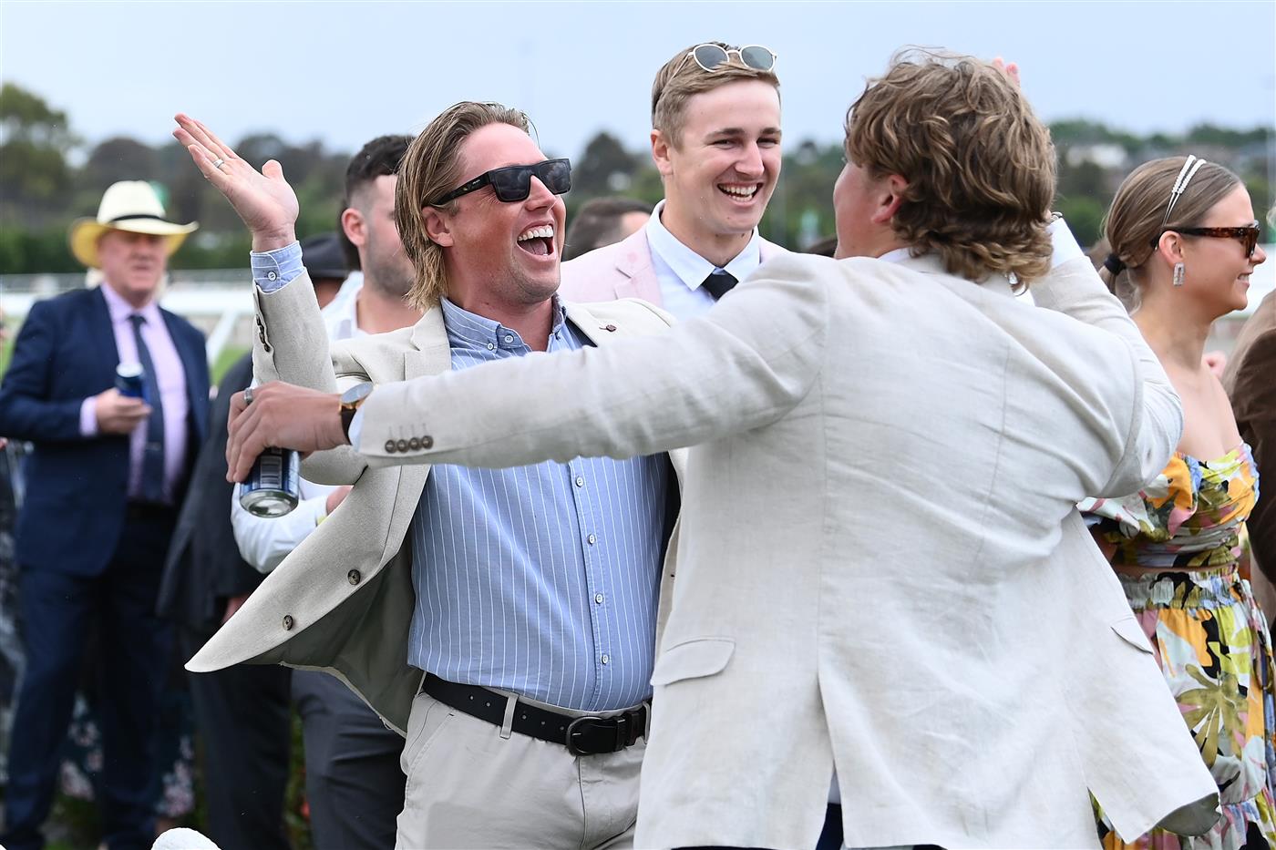 MELBOURNE, AUSTRALIA - NOVEMBER 01: Fans celebrate White Marlin winning Race 2, The Macca's Run during 2022 Lexus Melbourne Cup Day at Flemington Racecourse on November 01, 2022 in Melbourne, Australia. (Photo by Robert Cianflone/Getty Images)