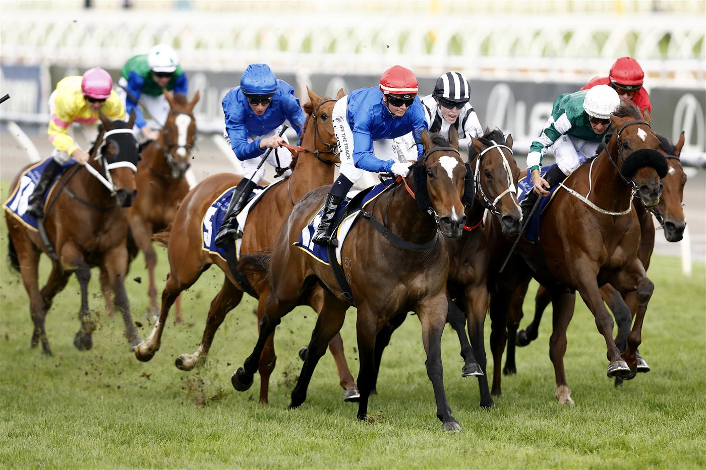MELBOURNE, AUSTRALIA - NOVEMBER 01: Jamie Kah rides Larkspur Run to win race 9 the Hong Kong Jockey Club Stakes  during 2022 Melbourne Cup Day at Flemington Racecourse on November 01, 2022 in Melbourne, Australia. (Photo by Darrian Traynor/Getty Images)