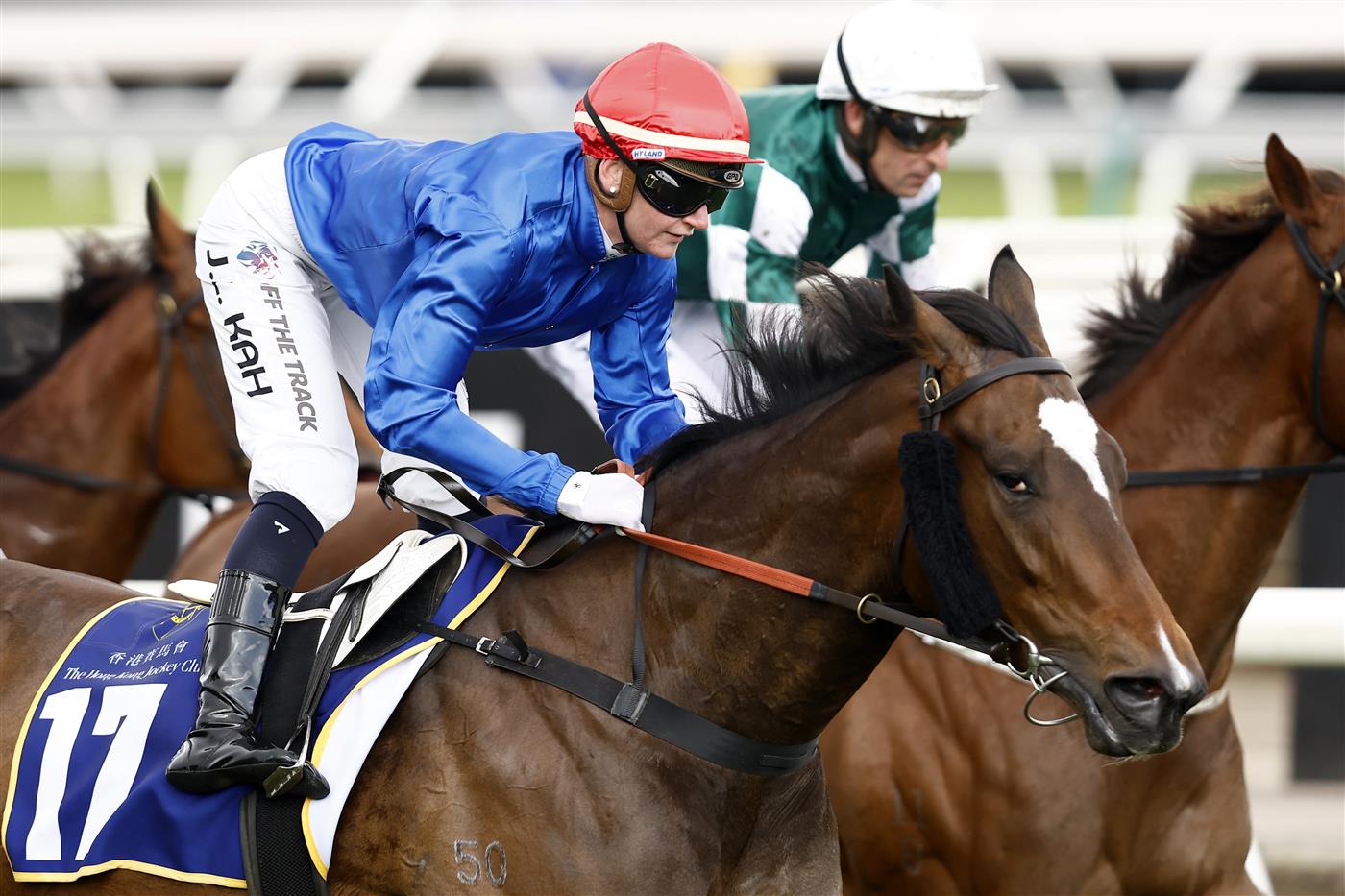MELBOURNE, AUSTRALIA - NOVEMBER 01: Jamie Kah rides Larkspur Run to win race 9 the Hong Kong Jockey Club Stakes  during 2022 Melbourne Cup Day at Flemington Racecourse on November 01, 2022 in Melbourne, Australia. (Photo by Darrian Traynor/Getty Images)