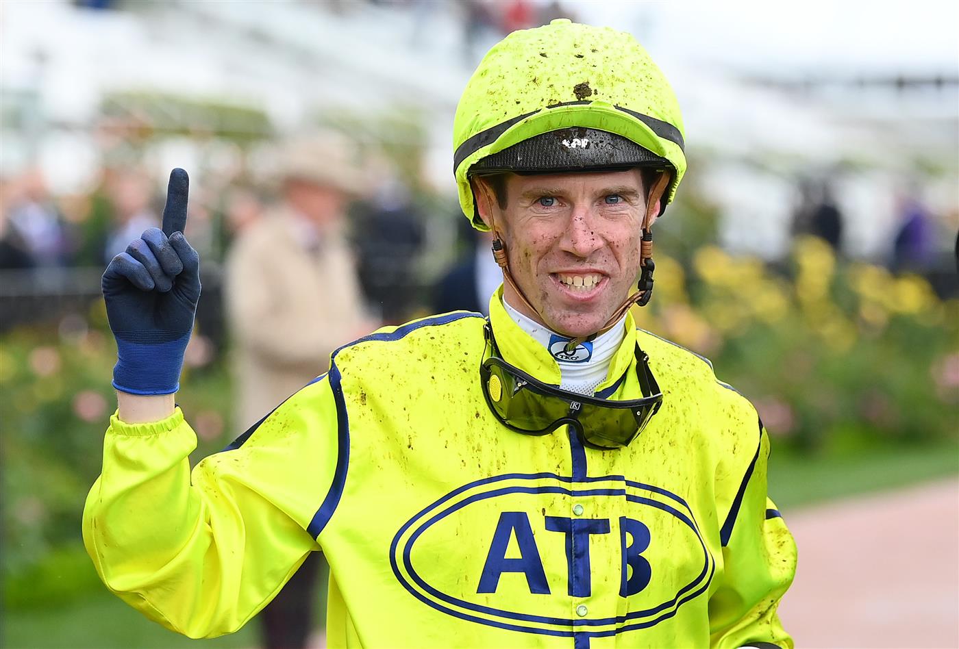 MELBOURNE, AUSTRALIA - NOVEMBER 01: John Allen riding Detonator Jack returns to scale after winning race eight the In Memory of Her Majesty Queen Elizabeth II during 2022 Lexus Melbourne Cup Day at Flemington Racecourse on November 01, 2022 in Melbourne, Australia. (Photo by Quinn Rooney/Getty Images)