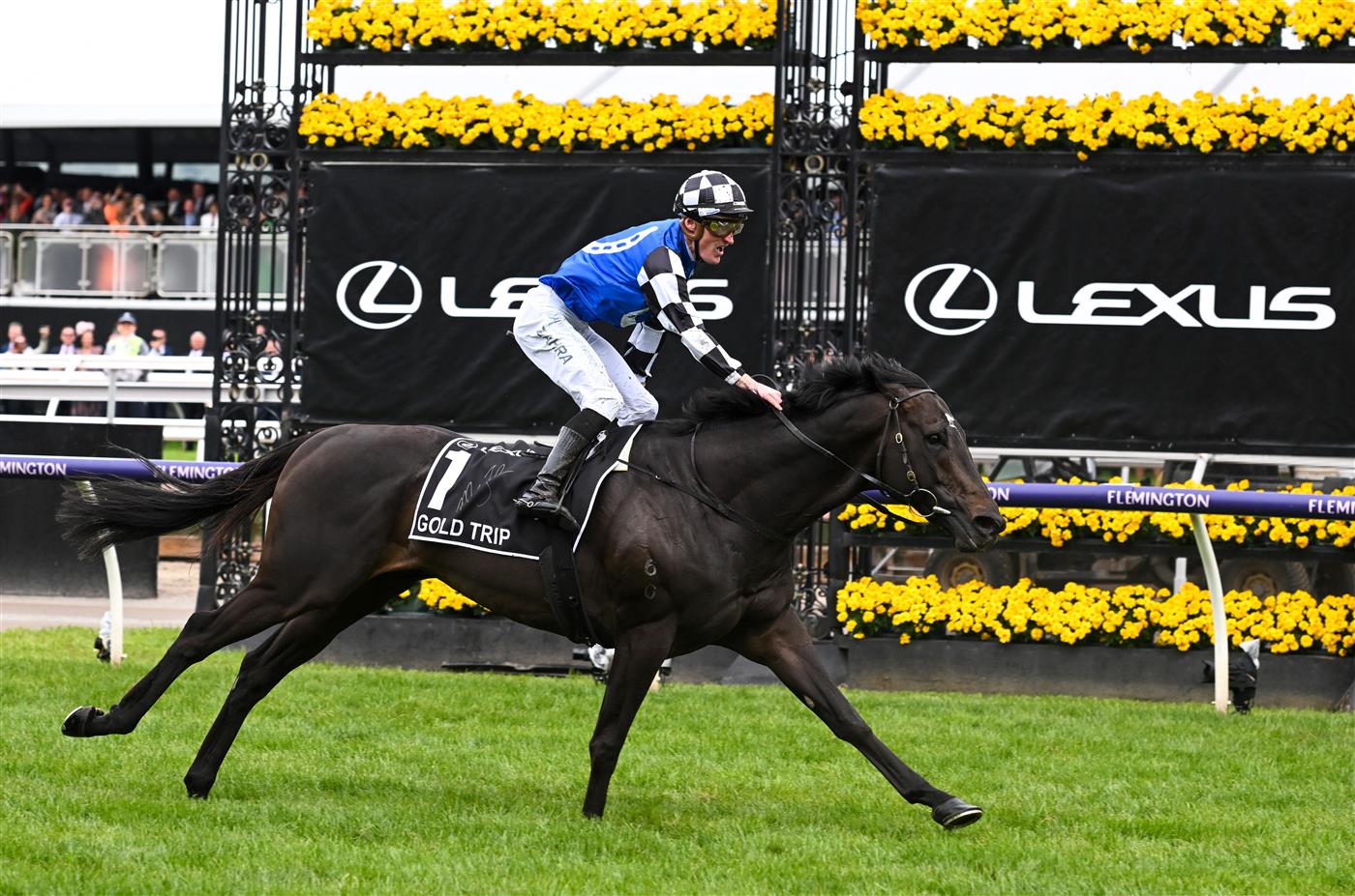 MELBOURNE, AUSTRALIA - NOVEMBER 01: Mark Zahra riding Gold Trip winning Race 7, the Lexus Melbourne Cup, during 2022 Lexus Melbourne Cup Day at Flemington Racecourse on November 01, 2022 in Melbourne, Australia. (Photo by Vince Caligiuri/Getty Images)