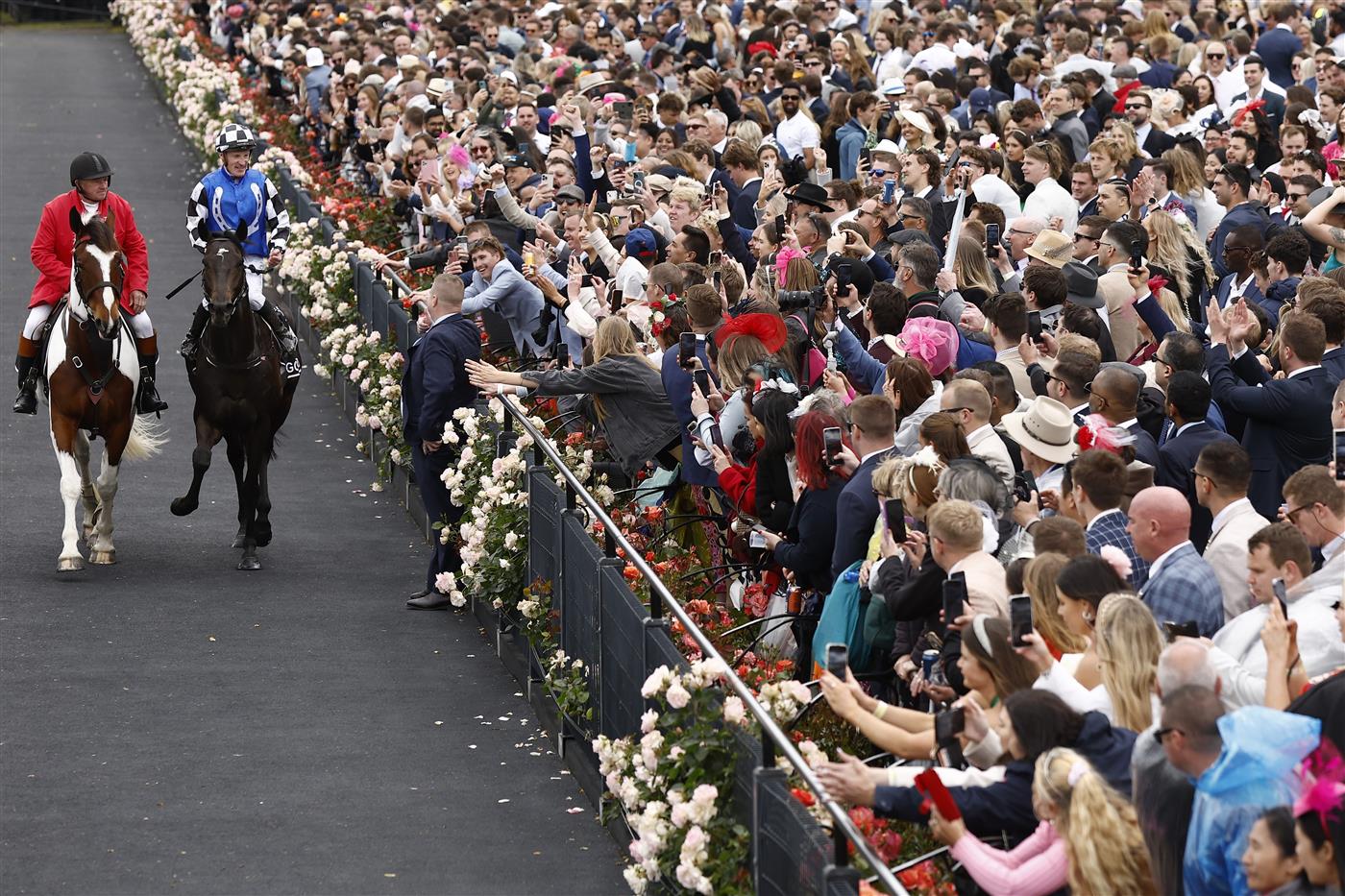 MELBOURNE, AUSTRALIA - NOVEMBER 01: Mark Zahra returns to scale on  Gold Trip after winning race 7 the Lexus Melbourne Cup during 2022 Melbourne Cup Day at Flemington Racecourse on November 01, 2022 in Melbourne, Australia. (Photo by Darrian Traynor/Getty Images)