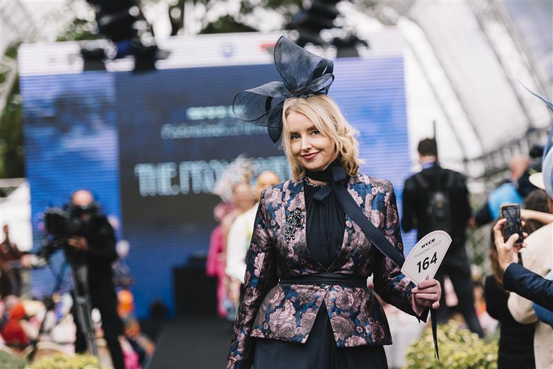 MELBOURNE, AUSTRALIA - NOVEMBER 03: Fashions on the Field contestants walk the runwayduring 2022 Oaks Day at Flemington Racecourse on November 03, 2022 in Melbourne, Australia. (Photo by Naomi Rahim/Getty Images for VRC)
