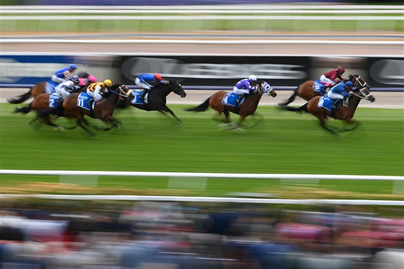 MELBOURNE, AUSTRALIA - NOVEMBER 03: James McDonald rides #8 Roots to win the Inglis Bracelet during 2022 Kennedy Oaks Day at Flemington Racecourse on November 03, 2022 in Melbourne, Australia. (Photo by Quinn Rooney/Getty Images)