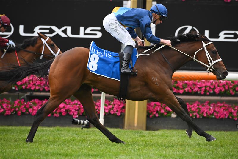 MELBOURNE, AUSTRALIA - NOVEMBER 03: James McDonald riding Roots winning Race 3, the Inglis Bracelet,  during 2022 Kennedy Oaks Day at Flemington Racecourse on November 03, 2022 in Melbourne, Australia. (Photo by Vince Caligiuri/Getty Images)