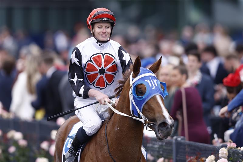 MELBOURNE, AUSTRALIA - NOVEMBER 03: Jamie McDonald returns to scale on Aitch Two Oh after winnin race 9 the Network 10 News Red Roses Stakes during 2022 Kennedy Oaks Day at Flemington Racecourse on November 03, 2022 in Melbourne, Australia. (Photo by Darrian Traynor/Getty Images)