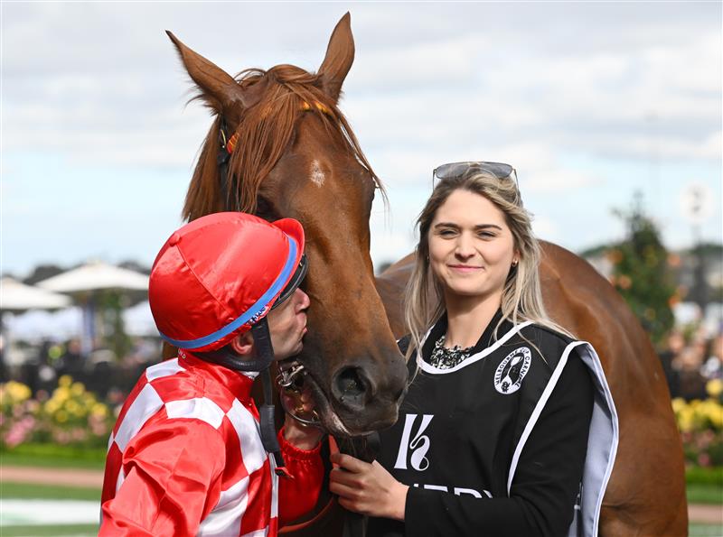 MELBOURNE, AUSTRALIA - NOVEMBER 03: Tommy Berry kisses after winning the Kennedy Oaks, during 2022 Kennedy Oaks Day at Flemington Racecourse on November 03, 2022 in Melbourne, Australia. (Getty)