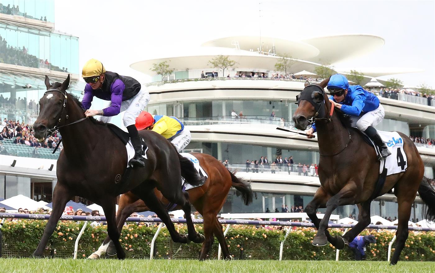 MELBOURNE, AUSTRALIA - NOVEMBER 03: Blake McDougall rides #15 Carlisle to win the Cirka Trophy during 2022 Kennedy Oaks Day at Flemington Racecourse on November 03, 2022 in Melbourne, Australia. (Photo by Robert Cianflone/Getty Images)