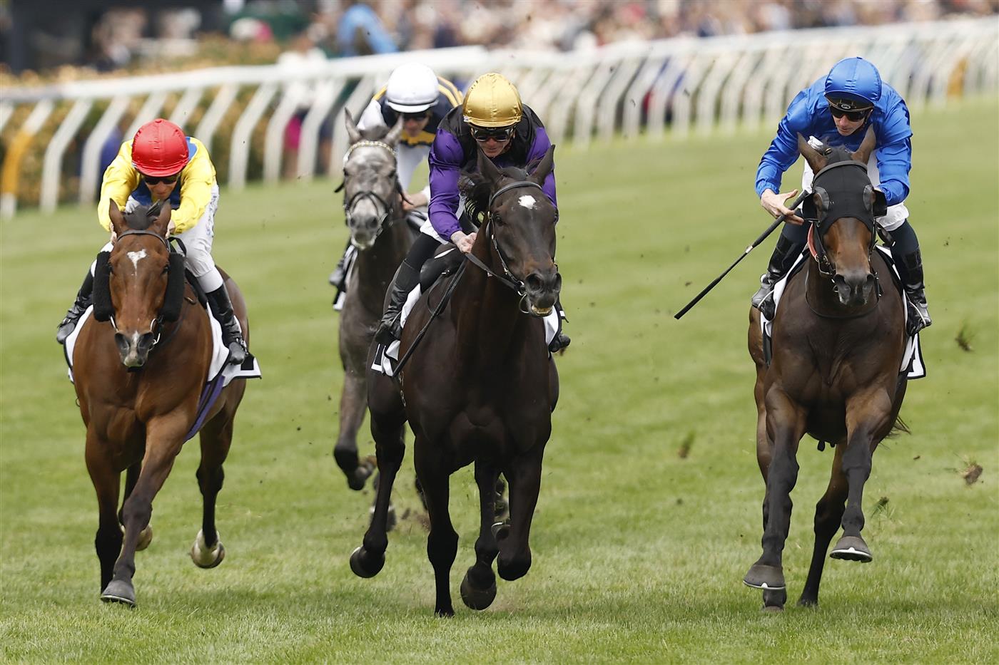 MELBOURNE, AUSTRALIA - NOVEMBER 03: Blake McDougall (second from right) rides Carlisle to win race 5 the Cirka Trophy  during 2022 Kennedy Oaks Day at Flemington Racecourse on November 03, 2022 in Melbourne, Australia. (Photo by Darrian Traynor/Getty Images)
