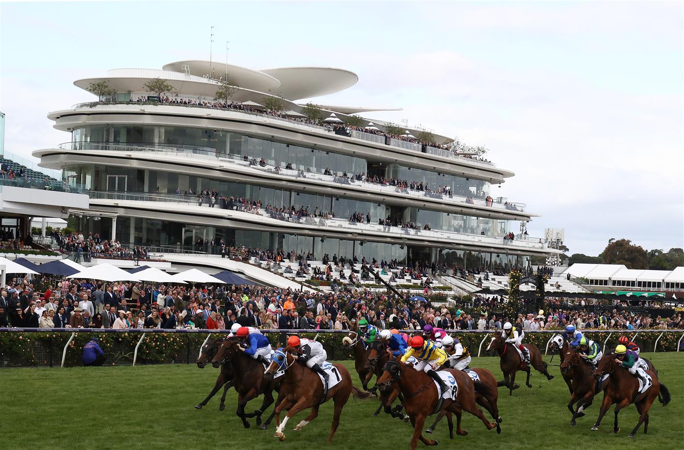 MELBOURNE, AUSTRALIA - NOVEMBER 03: Jake Toeroek rides #7 Aitch To Oh to win the 10 News First Red Roses Stakes during 2022 Kennedy Oaks Day at Flemington Racecourse on November 03, 2022 in Melbourne, Australia. (Photo by Robert Cianflone/Getty Images)