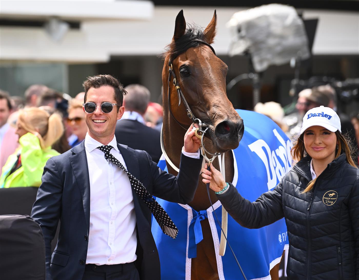 MELBOURNE, AUSTRALIA - NOVEMBER 03: Trainer Michael Kent Jnr poses with Charm Stone after winning Race 2, the Darley Ottawa Stakes during 2022 Kennedy Oaks Day at Flemington Racecourse on November 03, 2022 in Melbourne, Australia. (Photo by Vince Caligiuri/Getty Images)