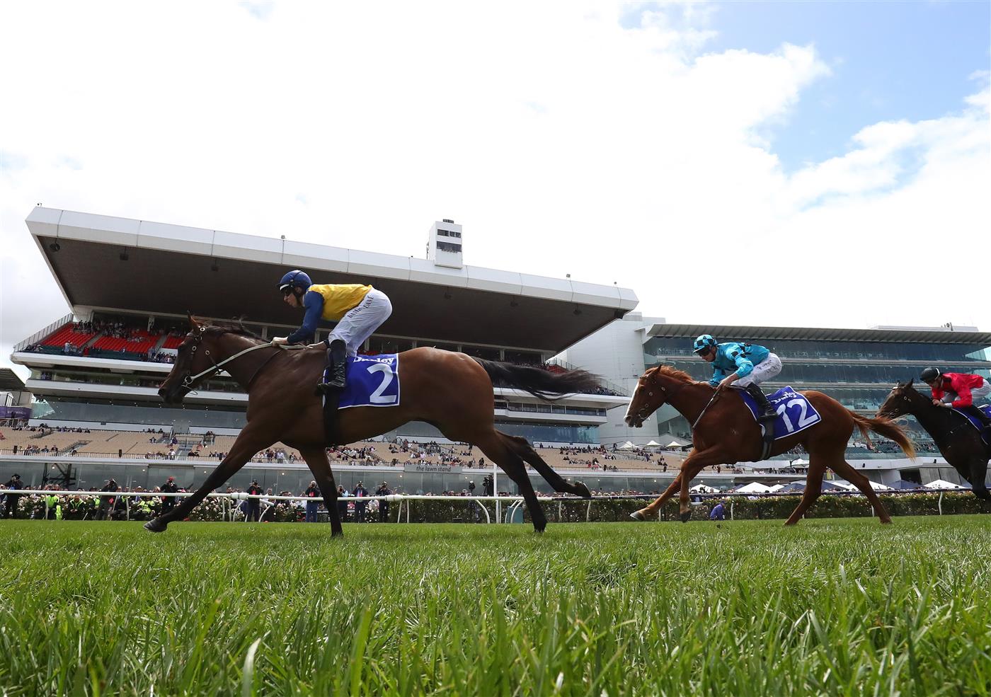 MELBOURNE, AUSTRALIA - NOVEMBER 03: Damian Lane rides #2 Charm Stone to win the Darley Ottawa Stakes during 2022 Kennedy Oaks Day at Flemington Racecourse on November 03, 2022 in Melbourne, Australia. (Photo by Robert Cianflone/Getty Images)