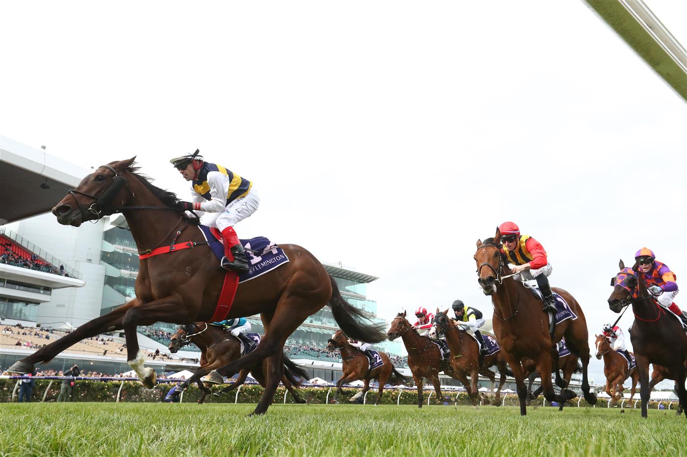 MELBOURNE, AUSTRALIA - NOVEMBER 03: Dean Yendall rides #14 Toregene to win the Melbourne Cup Carnival Country Final during 2022 Kennedy Oaks Day at Flemington Racecourse on November 03, 2022 in Melbourne, Australia. (Photo by Robert Cianflone/Getty Images)