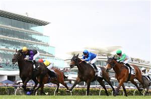 MELBOURNE, AUSTRALIA - NOVEMBER 03: Blake McDougall rides #15 Carlisle to win the Cirka Trophy during 2022 Kennedy Oaks Day at Flemington Racecourse on November 03, 2022 in Melbourne, Australia. (Photo by Robert Cianflone/Getty Images)