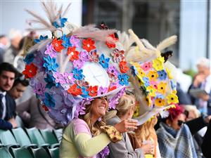 MELBOURNE, AUSTRALIA - NOVEMBER 03: Fans watch on during 2022 Kennedy Oaks Day at Flemington Racecourse on November 03, 2022 in Melbourne, Australia. (Photo by Quinn Rooney/Getty Images)