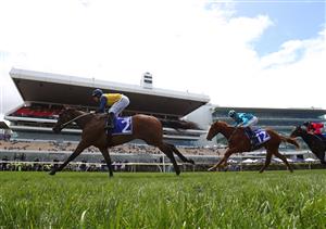 MELBOURNE, AUSTRALIA - NOVEMBER 03: Damian Lane rides #2 Charm Stone to win the Darley Ottawa Stakes during 2022 Kennedy Oaks Day at Flemington Racecourse on November 03, 2022 in Melbourne, Australia. (Photo by Robert Cianflone/Getty Images)