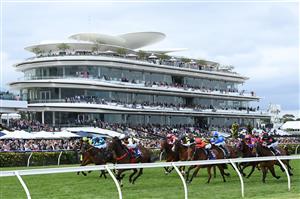 MELBOURNE, AUSTRALIA - NOVEMBER 03: Dean Yendall rides #14 Toregene to win the Melbourne Cup Carnival Country Final during 2022 Kennedy Oaks Day at Flemington Racecourse on November 03, 2022 in Melbourne, Australia. (Photo by Quinn Rooney/Getty Images)