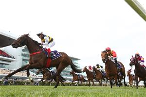 MELBOURNE, AUSTRALIA - NOVEMBER 03: Dean Yendall rides #14 Toregene to win the Melbourne Cup Carnival Country Final during 2022 Kennedy Oaks Day at Flemington Racecourse on November 03, 2022 in Melbourne, Australia. (Photo by Robert Cianflone/Getty Images)