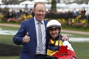 MELBOURNE, AUSTRALIA - NOVEMBER 03: Trainer Matthew Williams and Jockey Dean Yendall celebrate Toregene winning race 7 the Melbourne Cup Carnival Country Final during 2022 Kennedy Oaks Day at Flemington Racecourse on November 03, 2022 in Melbourne, Australia. (Photo by Darrian Traynor/Getty Images)